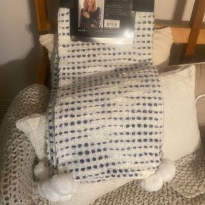 Nicole Miller
NEW
YORK Decorative Throw with Pom Poms, 50” x  60” (NEW)